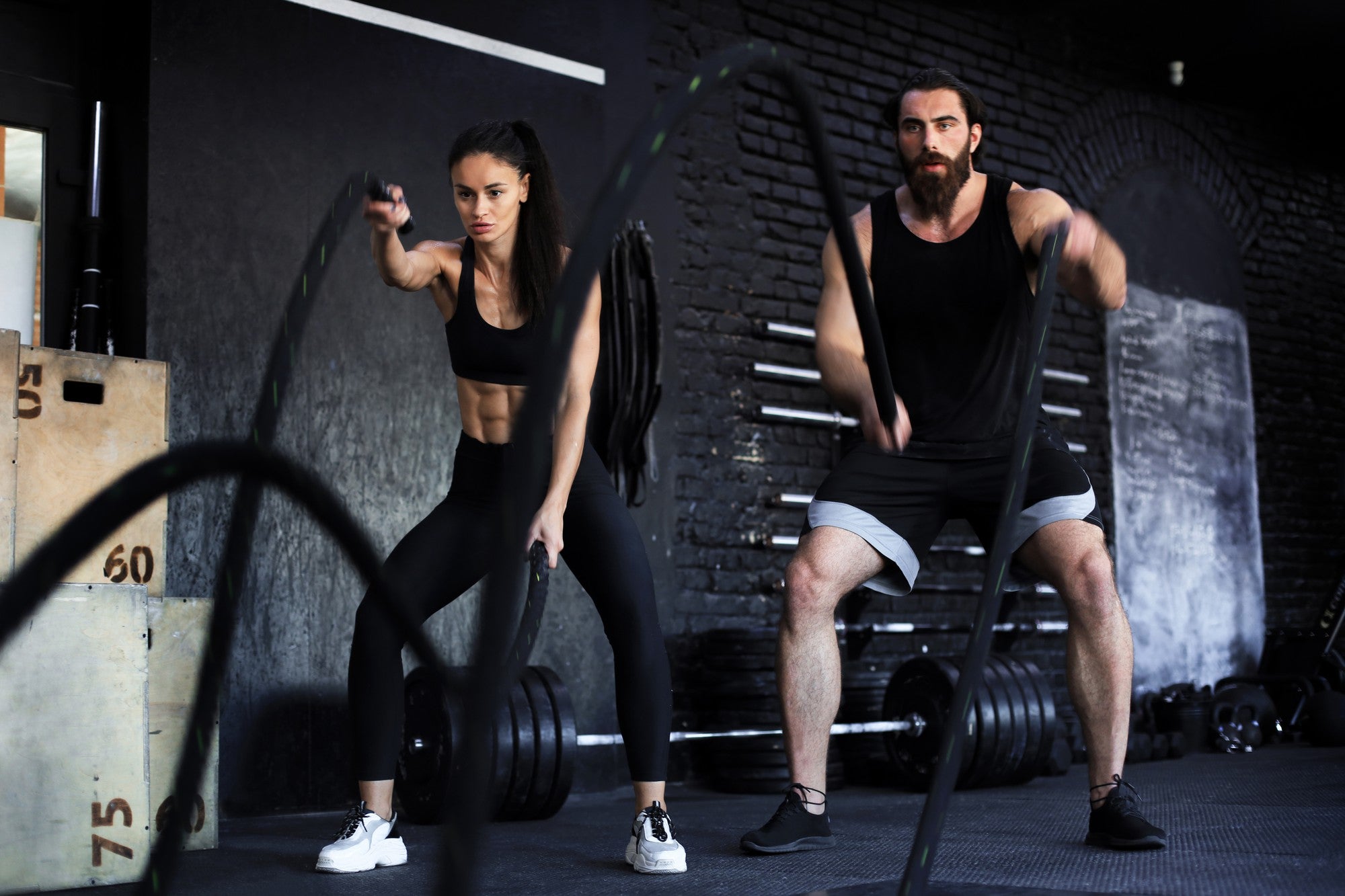 athletic-young-indian-couple-with-battle-rope-doing-exercise-functional-training-fitness-gym.jpg